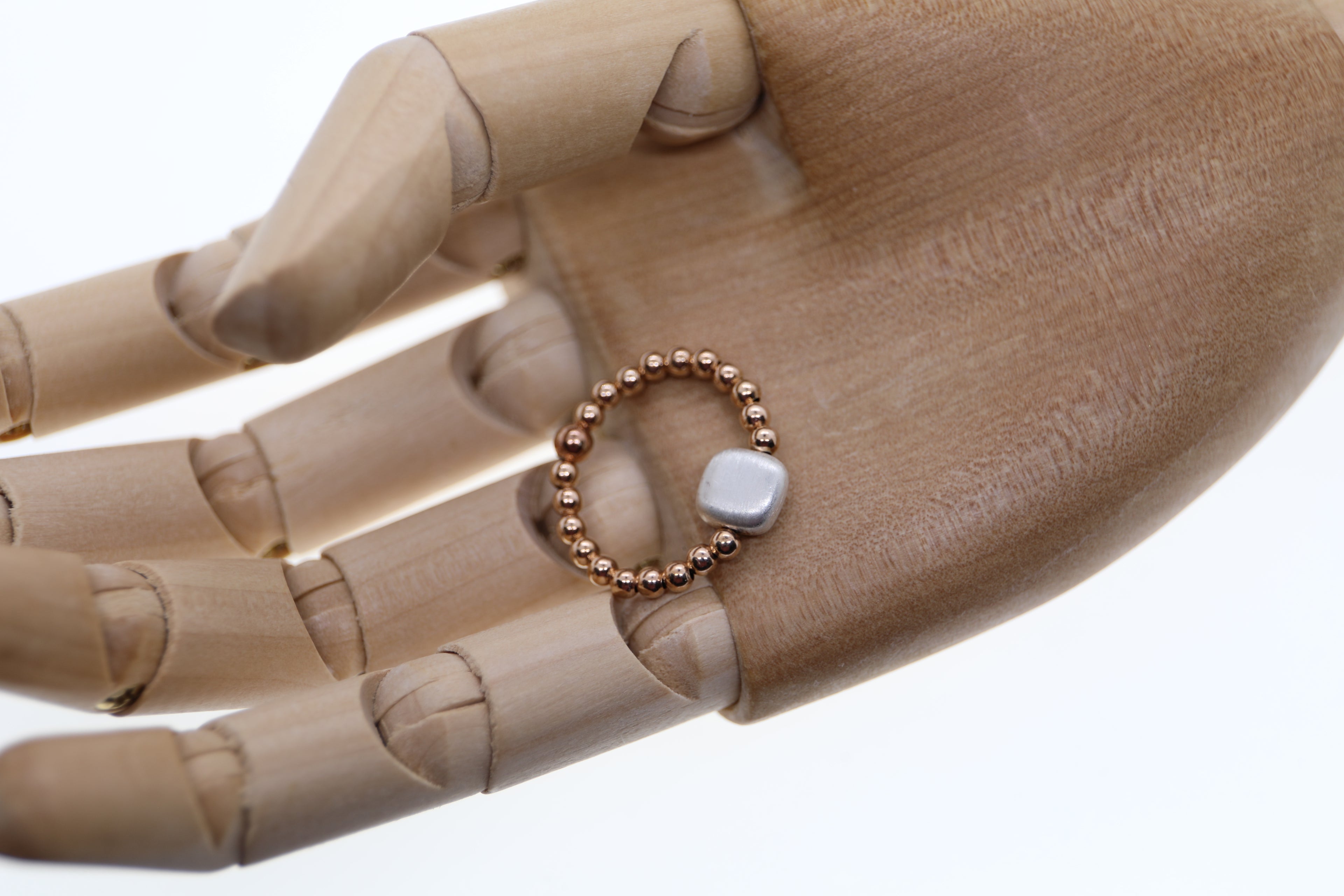 Rosé vergoldete Silberkugeln mit Silberelement