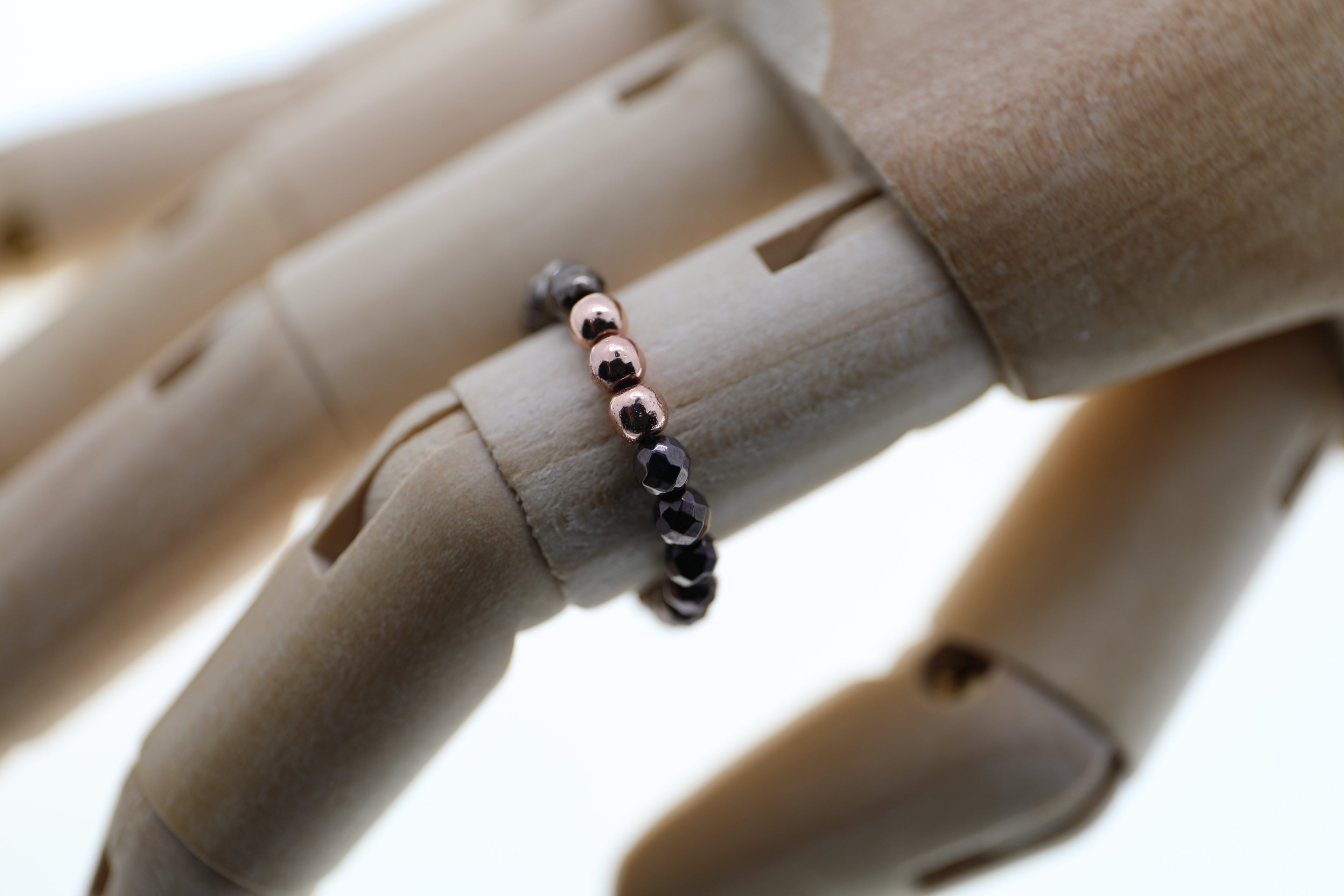 Rosé vergoldete Silberkungeln und braune Hämatitperlen