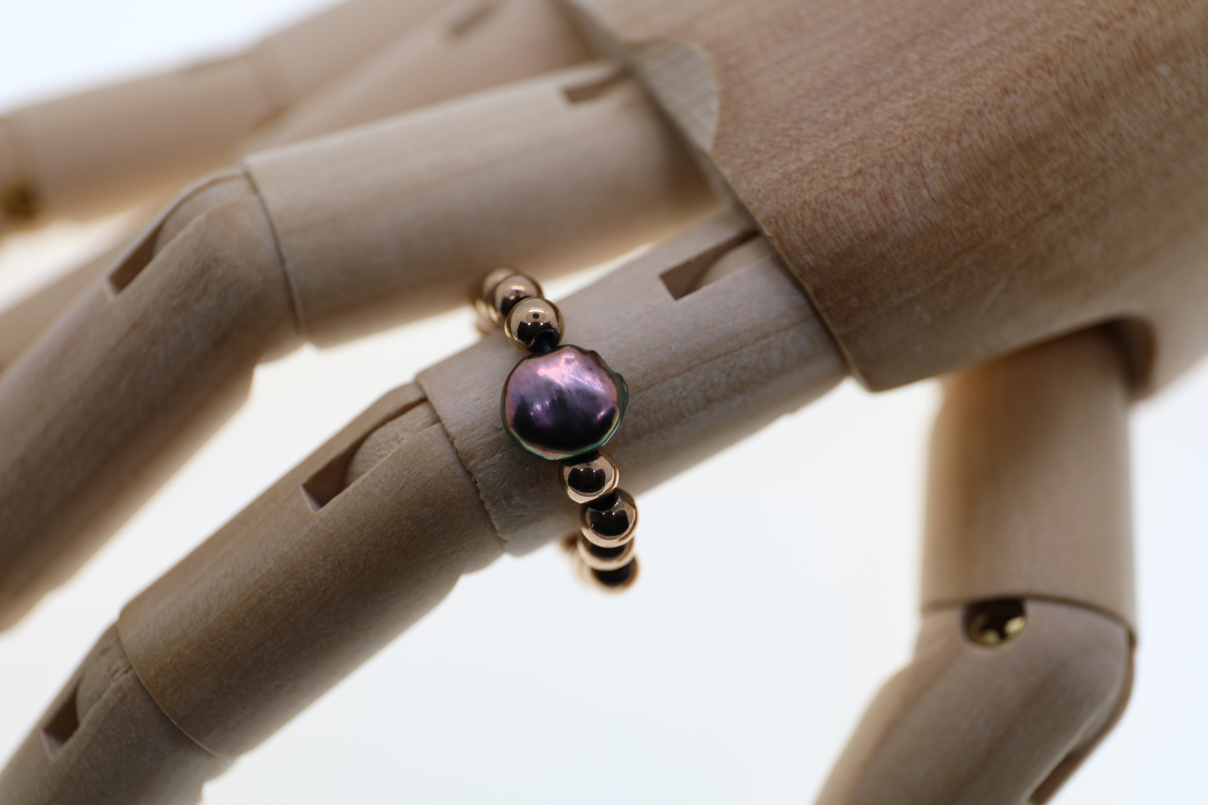 Braune Süßwasserperle mit broncefarbenem Hämatit und Silberkugel