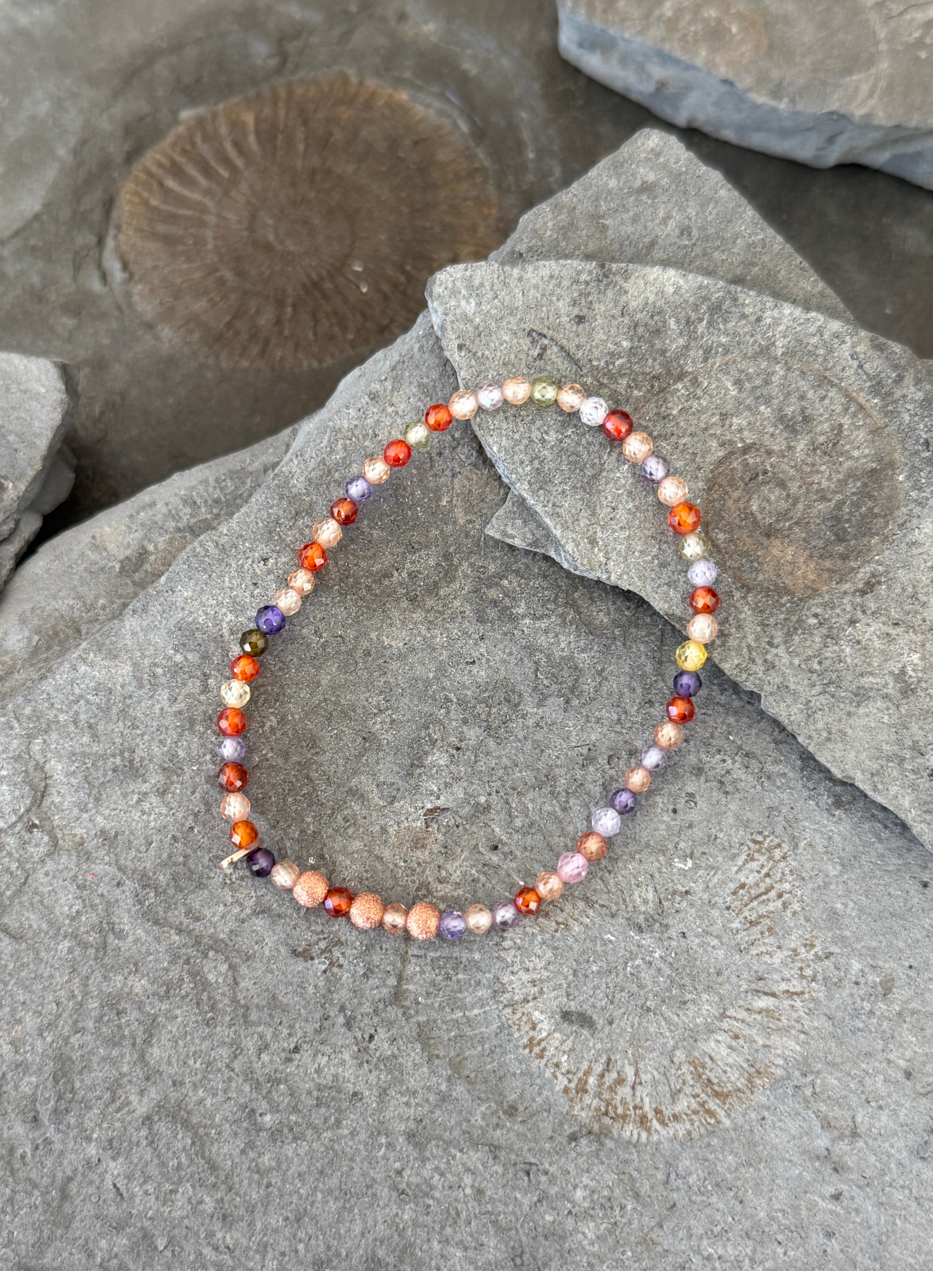 Zirkon und Silberelemente rosé vergoldet