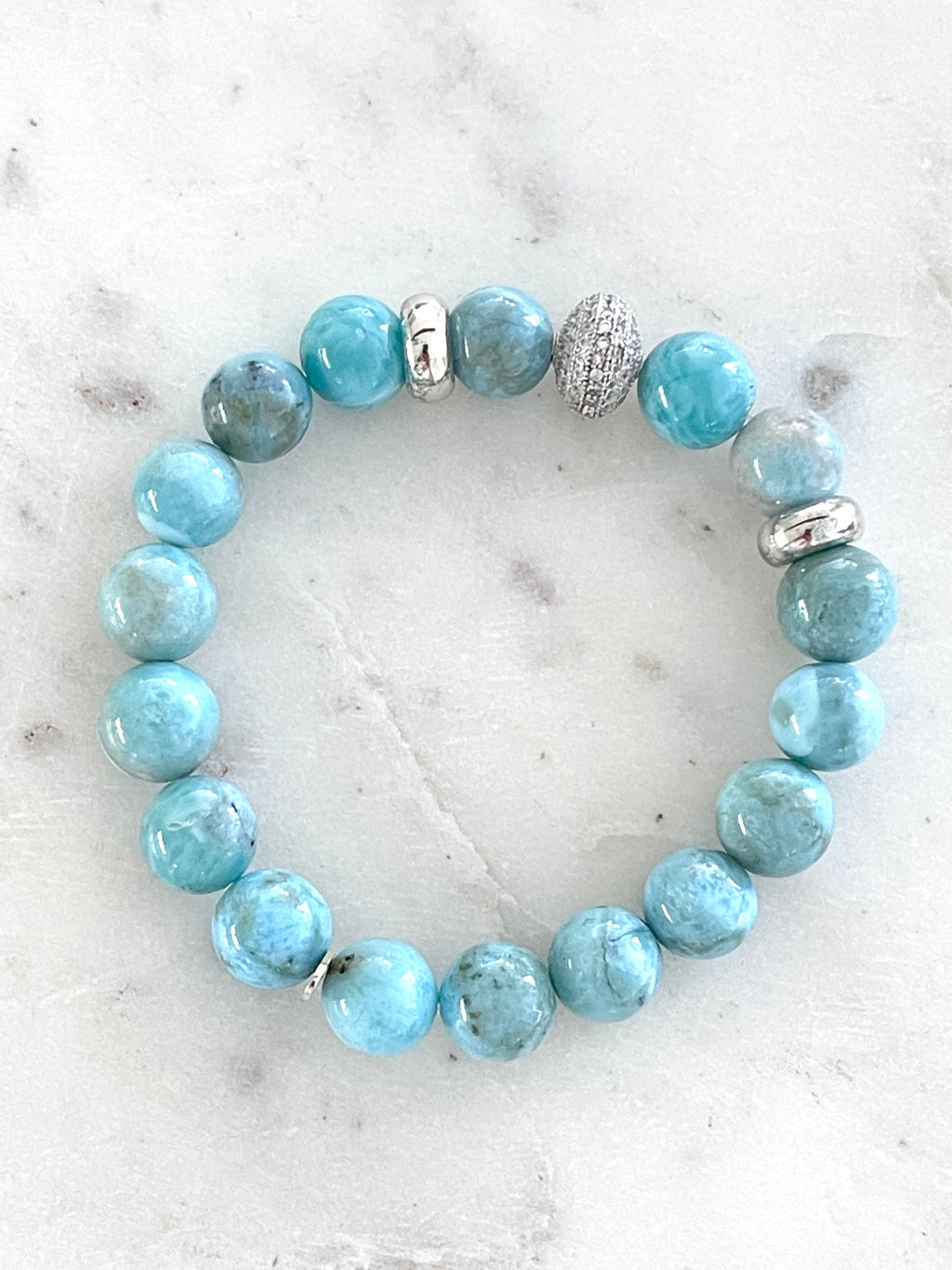 Larimar, rhodinierte Silberelemente und Zirkonia