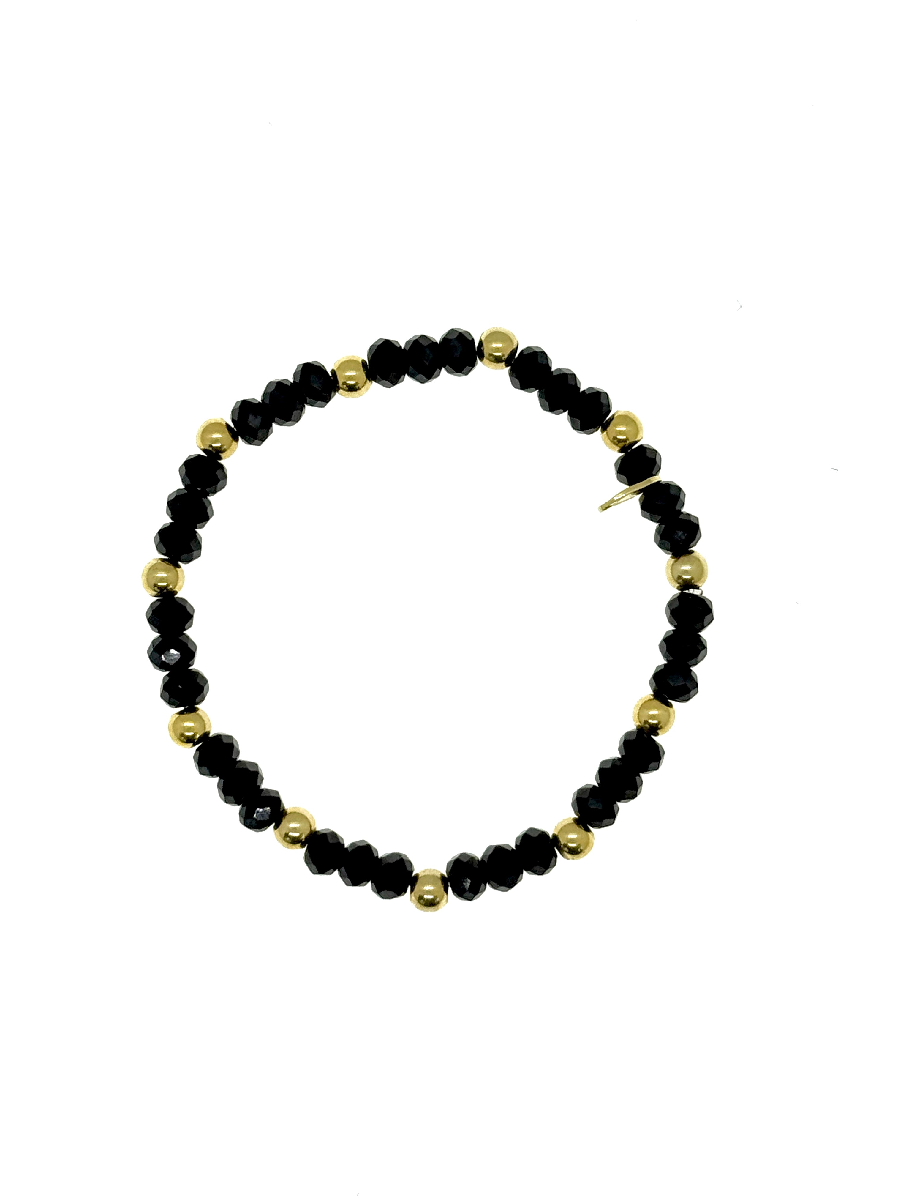 Schwarzer Spinell mit vergoldeten Silberkugeln