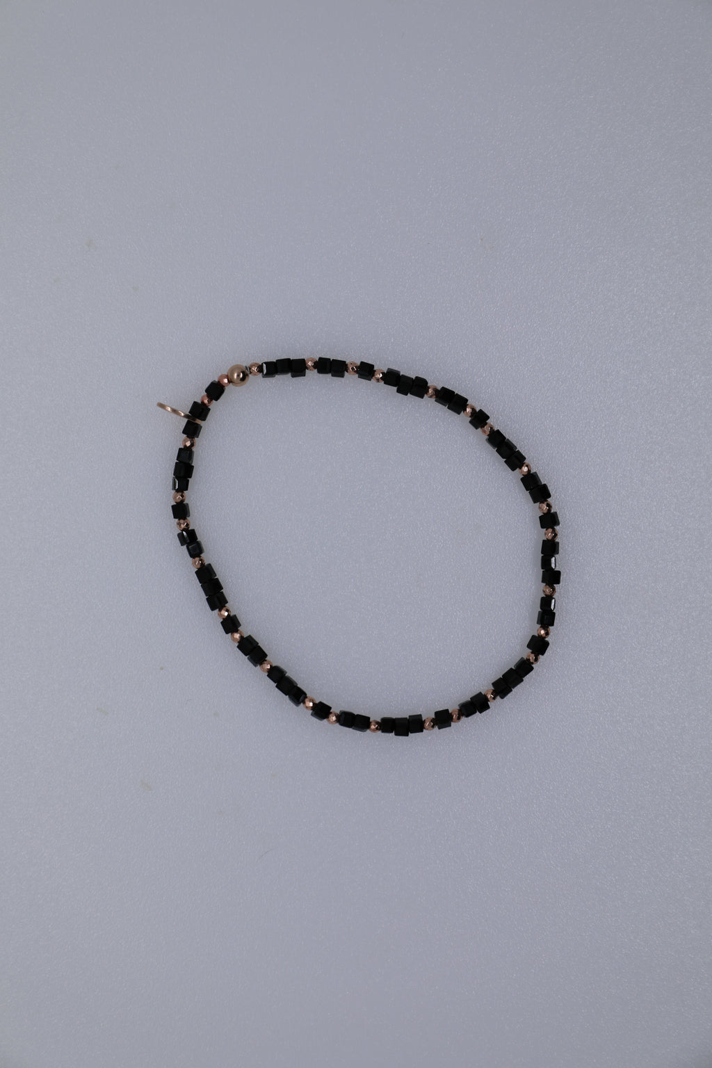 Armband oder Kette Schwarze Glasperlen mit rosé vergoldeten Silberkugeln