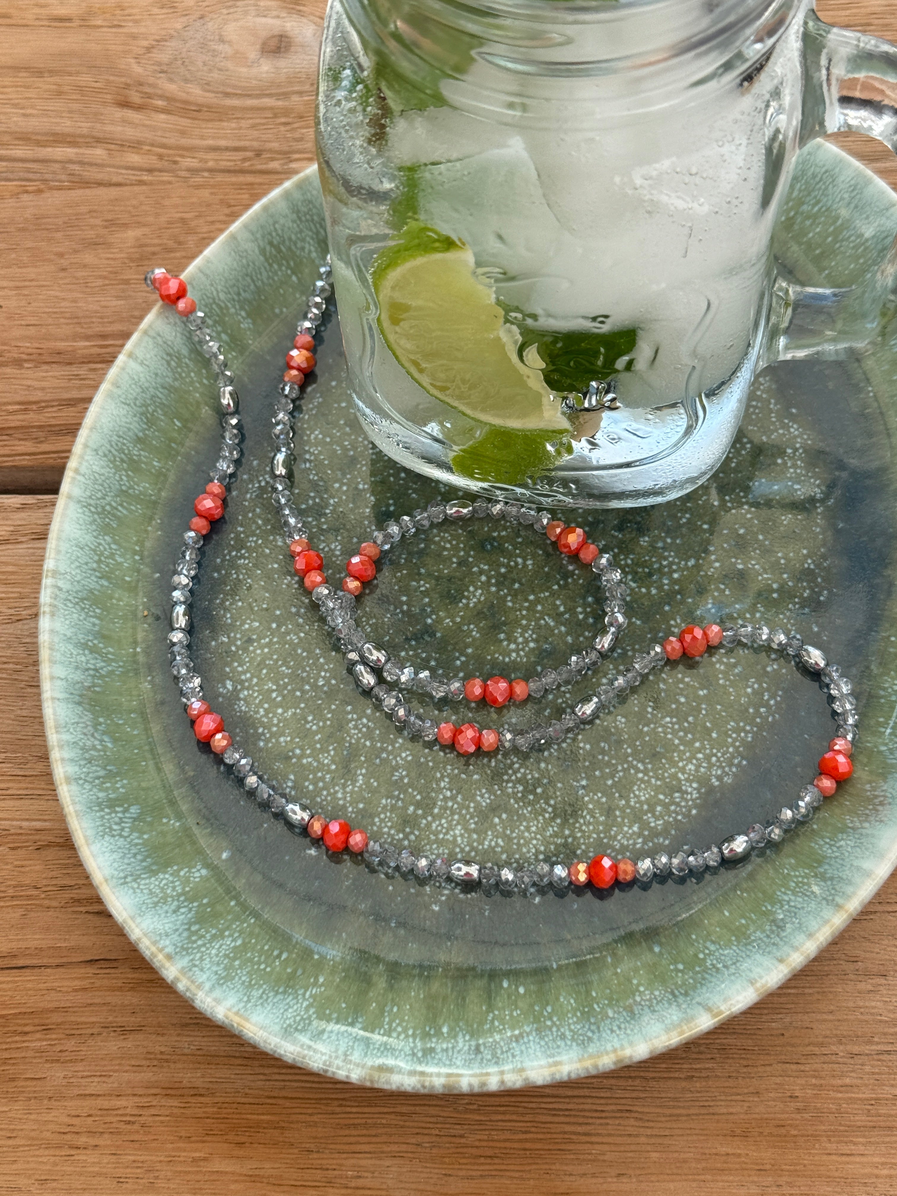 Brillenkette Orange und silberfarbene Glasperlen mit silberfarbenen Hämatite